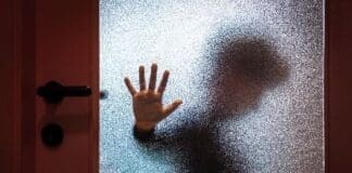 Eccac Hand On Door