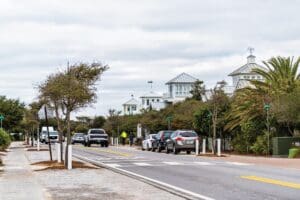 Houses Architecture Beach Ocean Cottages In Florida Panhandle On Cloudy Winter Day With Cars On Road Street Traffic