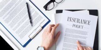 Business Woman Examining Insurance Policy