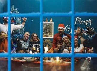 Big Family Taking Photo Together At Christmas