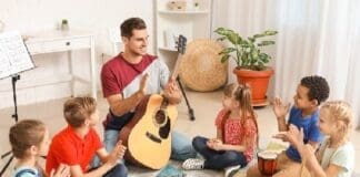 Teacher Giving Music Lessons At School