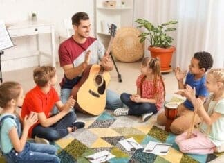 Teacher Giving Music Lessons At School