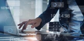 Businesswoman Working On Laptop Computer Analyzing Sales Data And Economic Growth Graph Chart. Business Strategy, Digital Market Report Analysis, Data Scientist