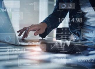 Businesswoman Working On Laptop Computer Analyzing Sales Data And Economic Growth Graph Chart. Business Strategy, Digital Market Report Analysis, Data Scientist