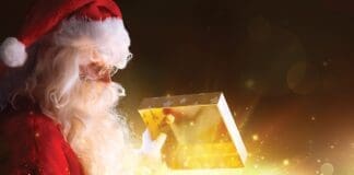 Santa Claus Opening Christmas Present With Shiny Stars