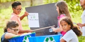 Children's Group In A Waste Glass Recycling Campaign