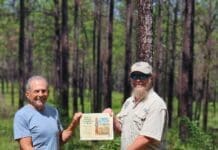 Fwc Biologist Ed O'daniels Presenting Landowner Michael Jenkins With His Certificate And Sign. Photo By Ian Stone (1)