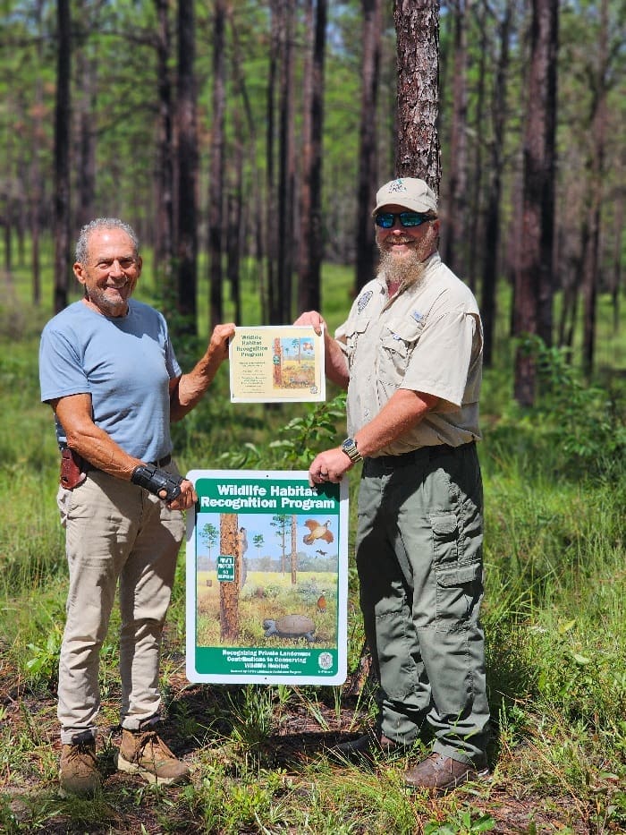 Fwc Biologist Ed O'daniels Presenting Landowner Michael Jenkins With His Certificate And Sign. Photo By Ian Stone (1)