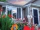 Front Of House With Natural Light With Flowers