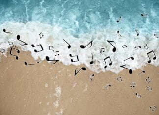 Sounds,of,nature.,musical,notes,scattered,above,rolling,ocean,waves