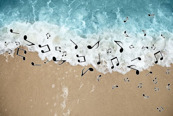 Sounds,of,nature.,musical,notes,scattered,above,rolling,ocean,waves